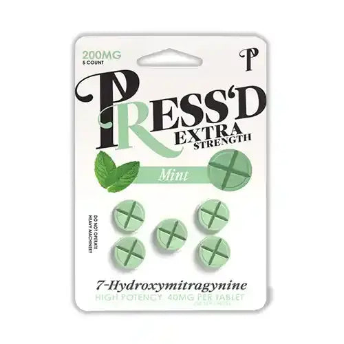 white blister pack of 5 green pressd tablets