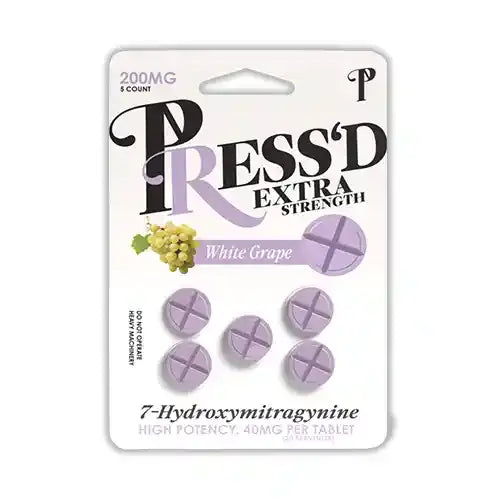 white blister pack of 5 purple pressd tablets