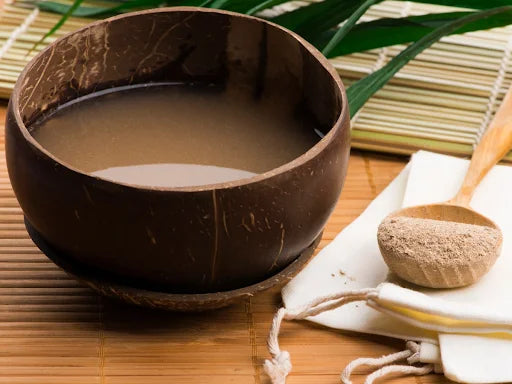 bowl of kava beverage with spoon next to it