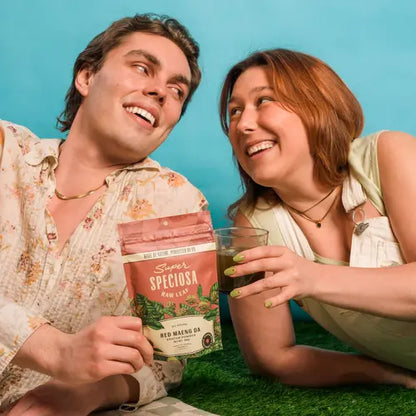 people sharing bag of red Maeng da powder